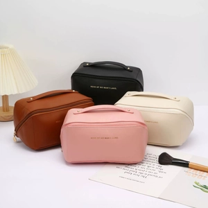 Portable large capacity PU leather cosmetic bag in four colors with gold zipper closure