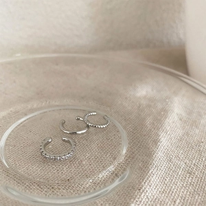 Three-piece silver ear cuff set with pavé cubic zirconia and textured minimalist designs