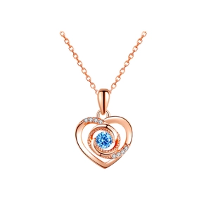 Collier pendentif cœur en or rose avec pierre bleue et zircone cubique sur chaîne argent