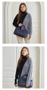 Deep blue pebble leather tote bag for women with round top handles and silver crossbody strap