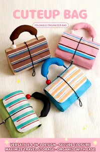 Macro detail of foldable stripe makeup bag featuring 4-in-1 design and velcro closure