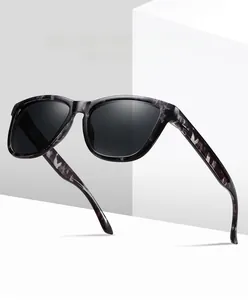 Detailed close-up of stylish grey marble pattern sunglasses with dark polarized lenses