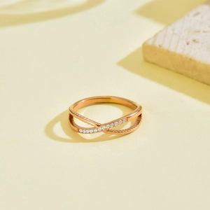 Elegant rose gold criss-cross X ring with micro-pave cubic zirconia in stainless steel