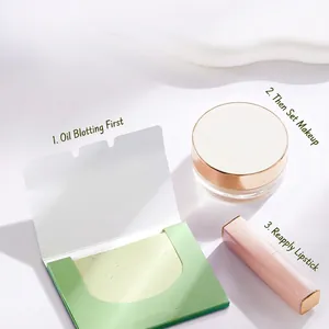 Portable 100-sheet face oil blotting paper set with loose powder and pink lipstick