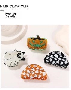 Set of Halloween hair claw clips featuring pumpkin and ghost designs on white background