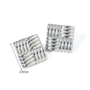Macro shot of silver textured square earrings with wavy pattern measuring 2.97cm