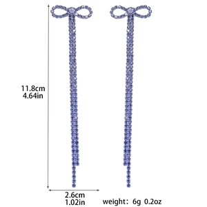 Detailed view of lavender bow tassel earrings with dimensions showing 11.8cm length