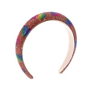 Sparkly wide headband with colorful rhinestones for a high cranial top hairstyle look
