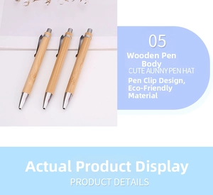 Detail of eco-friendly bamboo pens with silver metal clips and smooth wooden texture