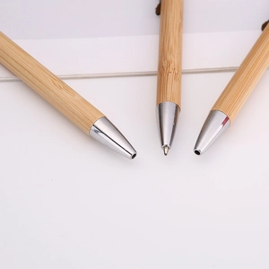 Eco-friendly bamboo ballpoint pens with silver metal tips for corporate business gifts