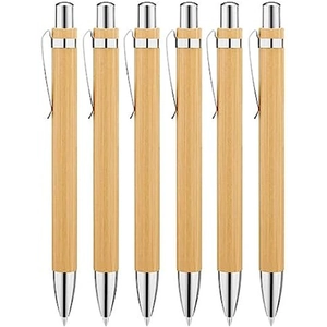 Set of six eco-friendly bamboo ballpoint pens with silver metal clips on white background