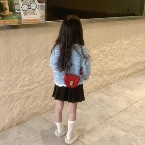 Toddler girl wearing Korean style red mini saddle bag with blue tweed jacket and skirt