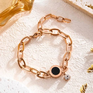 Rose gold stainless steel bracelet with Roman numeral pendant and sparkling crystal