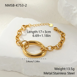 Detail of gold stainless steel link bracelet with 17+3cm length and 3.4cm ring width