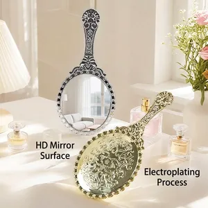 Vintage Baroque style hand-held makeup mirrors in electroplated gold and silver finishes