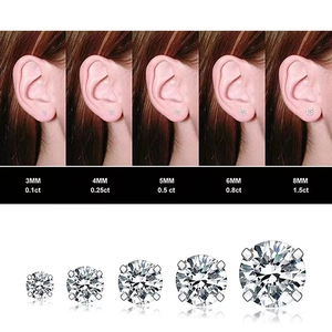 Four-prong stainless steel stud earrings set with zircon stones in various sizes