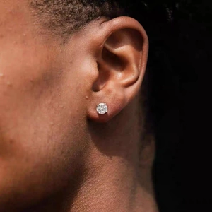 Macro shot of a four-prong stainless steel stud earring with sparkling cubic zirconia