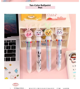 Detail of multi-color cartoon pens with 10 inks and glitter animal toppers on a desk