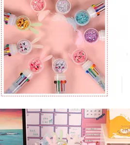 Close-up of colorful cartoon sequin multi-color pens in a creative desk arrangement