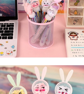 Detail of cute 10-color ballpoint pen with sequin rabbit ear topper and pink mesh holder