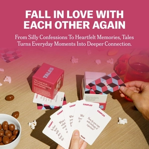 Close-up of TALES couples conversation cards with red packaging on a wooden table