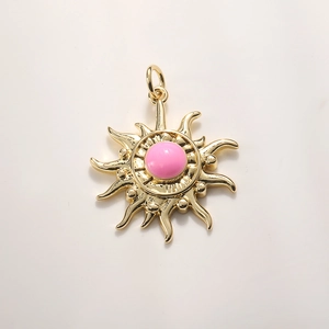 Golden sun pendant charm with pink enamel center for DIY jewelry making and necklaces