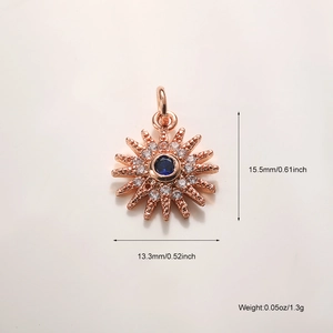 Detail of rose gold sunburst pendant with blue gemstone and dimensions 15.5mm x 13.3mm