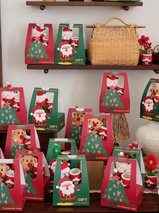 Christmas gift box set featuring ceramic mug and plush toy in a window display packaging