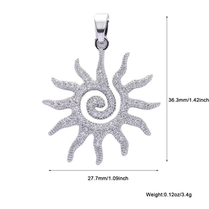 Detail of sun pendant with dimensions 36.3x27.7mm featuring silver zircons
