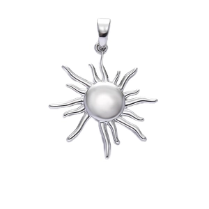 Detail of sun shaped silver pendant with white pearl inlay and radiant metal frame