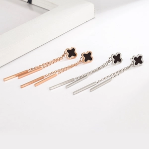 Clover tassel drop earrings in rose gold and silver finishes with black clover studs