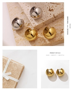 Detailed view of chunky hollow hoop earrings in polished gold and silver finishes