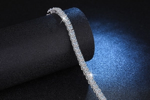Macro shot of silver S925 sterling silver hip hop tennis bracelet with moissanite