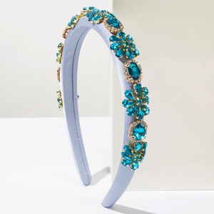 Detailed view of Baroque headband featuring blue crystals and intricate floral beadwork