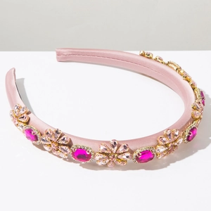 Detail of pink satin headband with luxury baroque crystals and floral gemstone patterns