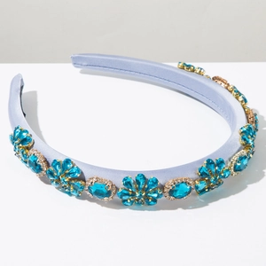 Detail of light blue crystal floral patterns and lilac satin wrap on Baroque headband