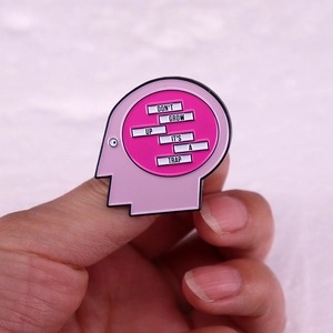 Human brain profile enamel pin with slogan Don't Grow Up It's A Trap message