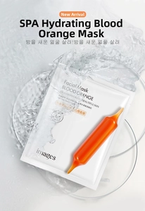 Close-up of Blood Orange hydrating facial mask with ampoule on clear water surface