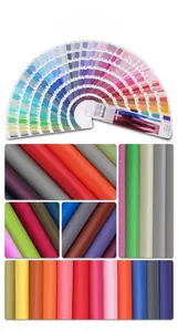 Detailed swatches of multi-color nylon fabrics and leather textures with color guide book