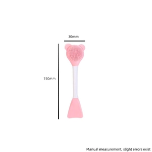 Dual-sided silicone facial cleanser brush and cream applicator tool in pink and white