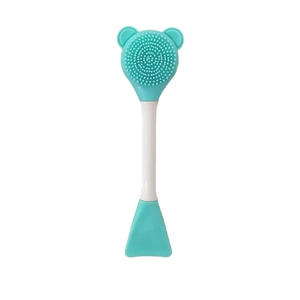 Dual-ended mint green silicone face cleanser brush and face mask applicator with bear ears