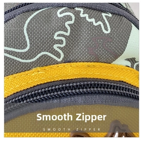 Detail of smooth high-quality zipper on canvas kids dinosaur crossbody bag for boys and girls