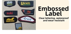 Detail of waterproof PVC rubber labels with clear logo printing and durable texture