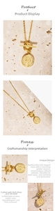 Close-up of S925 sterling silver OT toggle necklace with Elizabeth II coin pendant