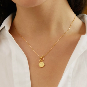 925 Sterling silver gold-plated coin pendant necklace with OT clasp on female model