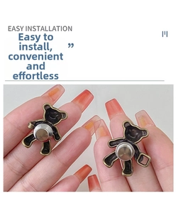 Detail of vintage bear-shaped metal waist buckle pins with easy installation guide