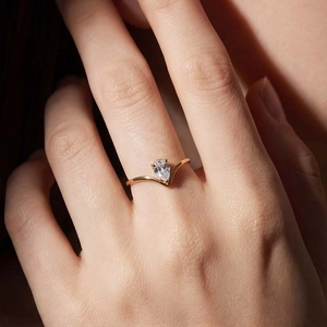 Elegant 18K gold plated V-shaped chevron ring with sparkling pear cut zircon gemstone