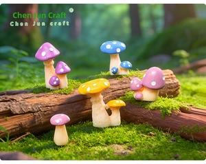 Close-up of miniature resin mushrooms in various colors on mossy wood landscape