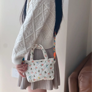 Quilted floral mini crossbody bag with cartoon bear print and colorful woven strap