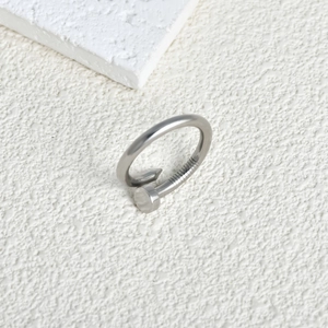 Minimalist stainless steel nail ring with polished finish and wrap-around design for women